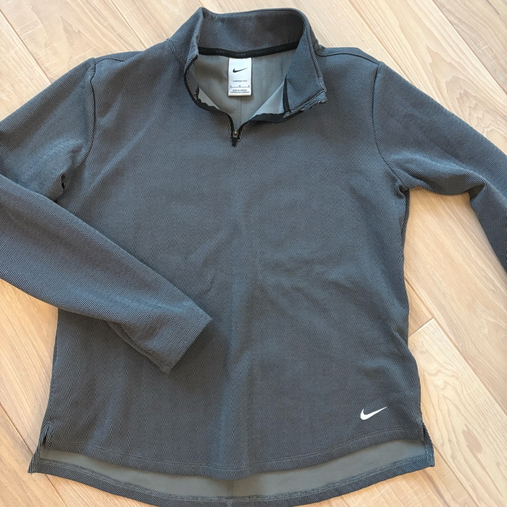 Nike women’s Therma-fit half zip. Size Medium.
